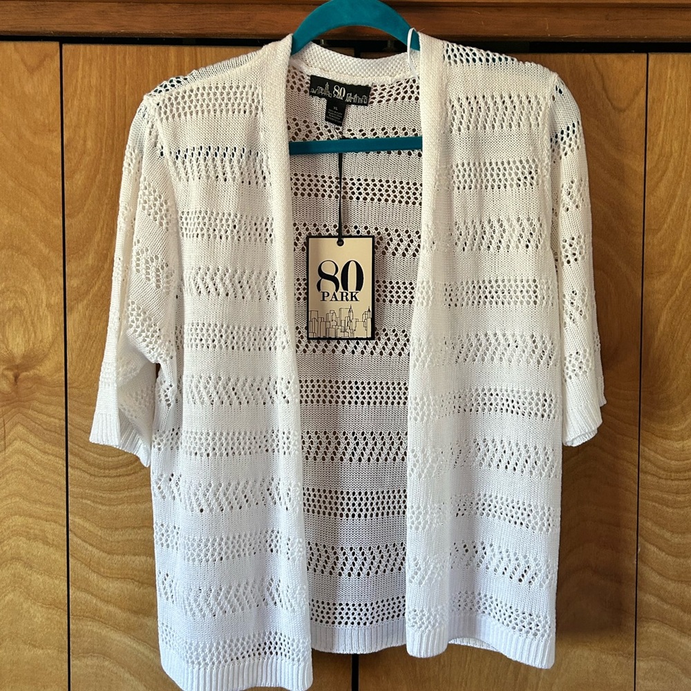 White short sleeve, sweater cardigan.